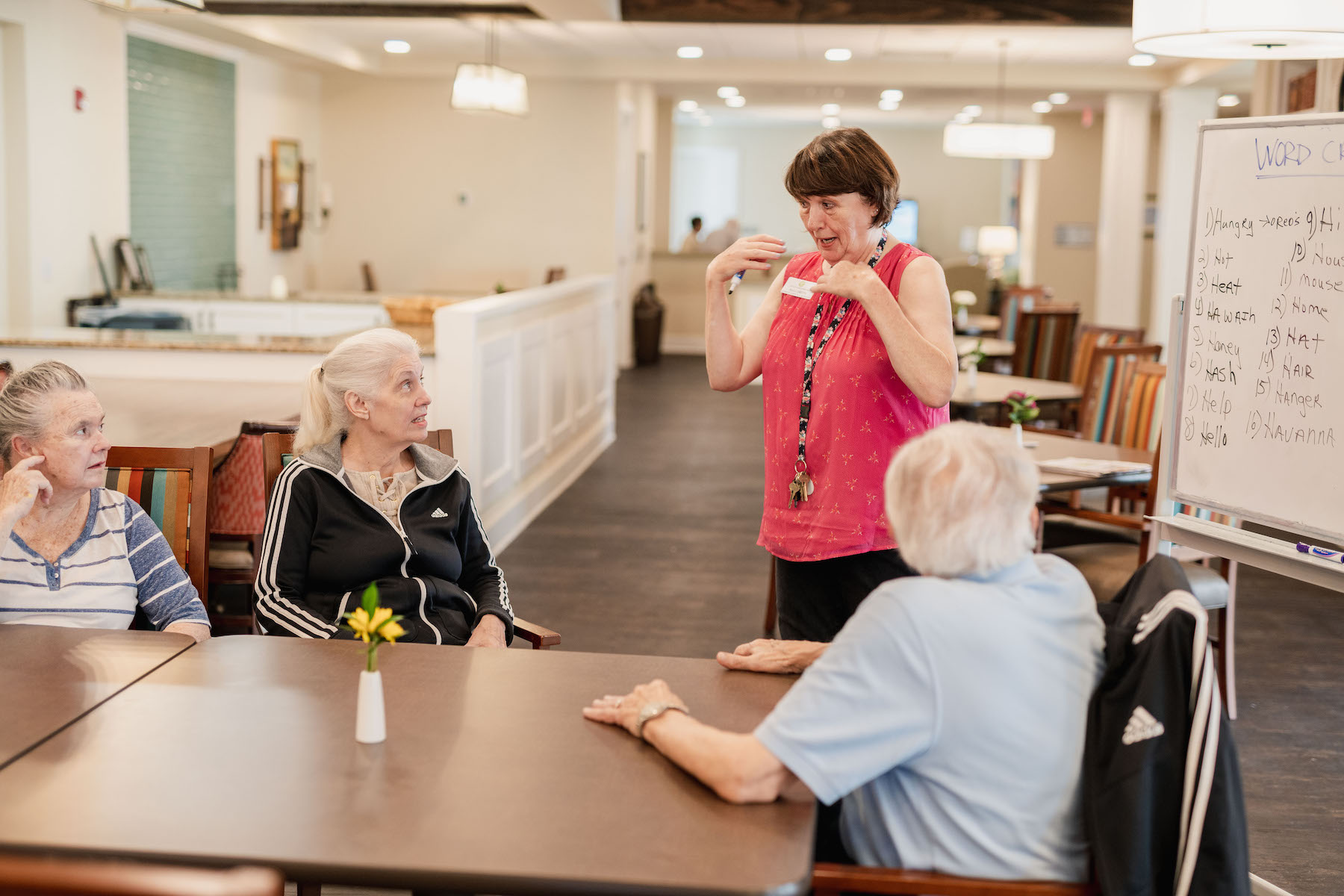 The Preserve at Meridian employee helping out senior residents