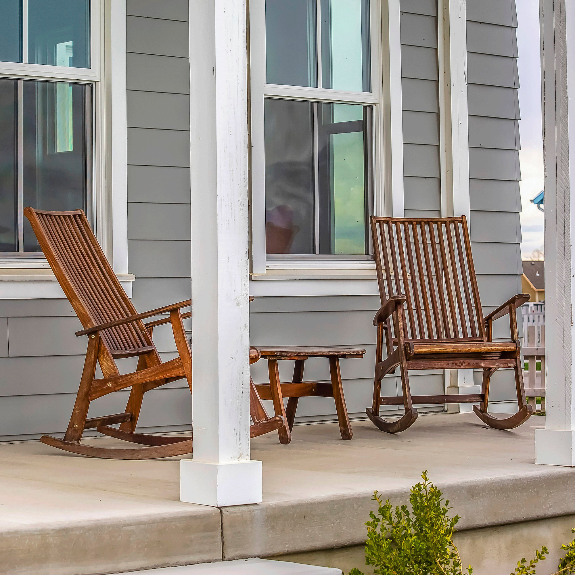The Claiborne at Shoe Creek rocking chairs on porch
