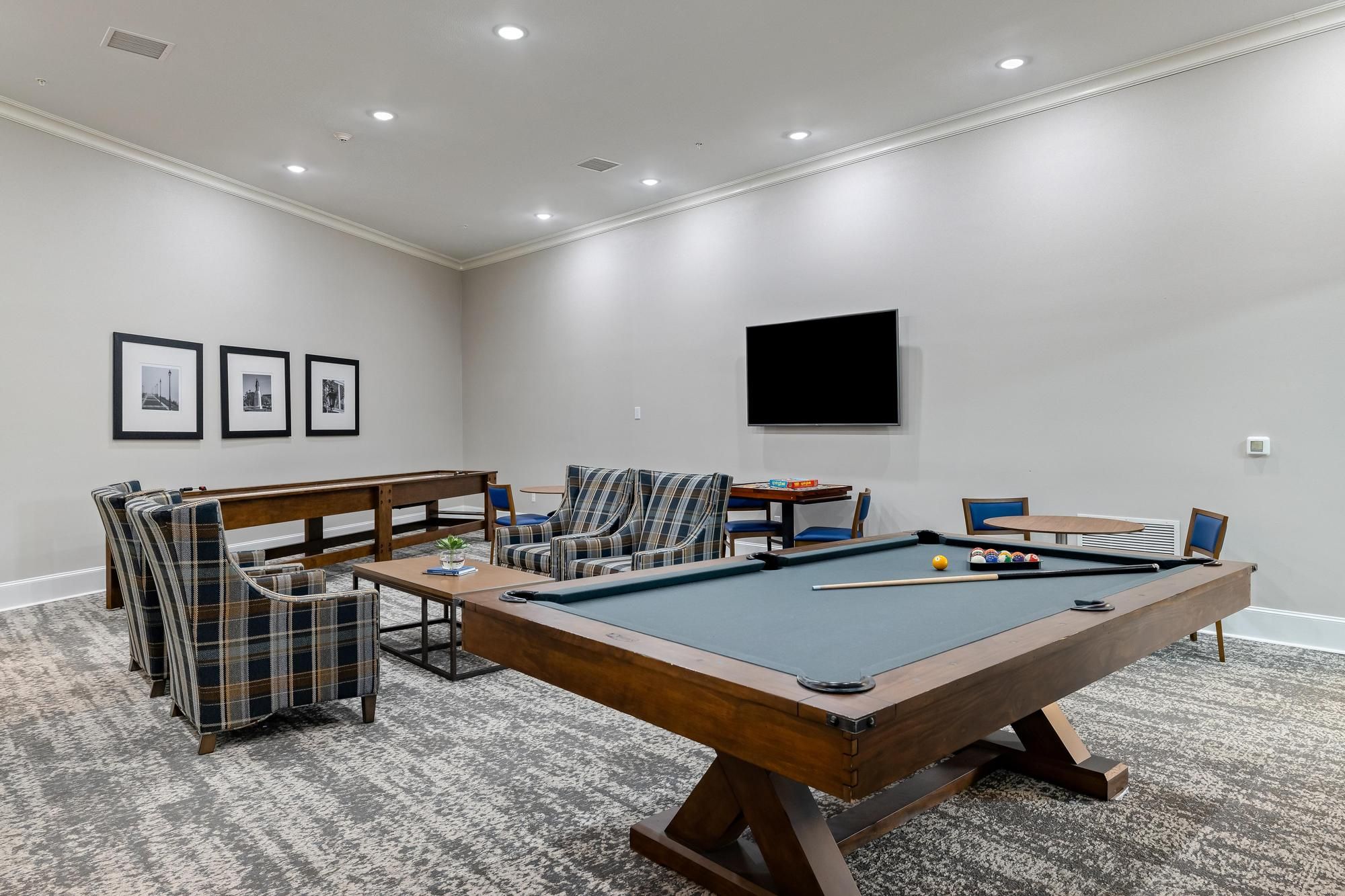 The Claiborne at Baton Rouge senior community game room with pool table