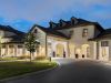 The Claiborne at Baton Rouge senior community exterior view, lit up at night