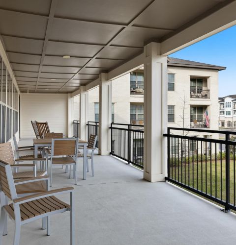 The Claiborne at Baton Rouge lounge area with seating and front desk