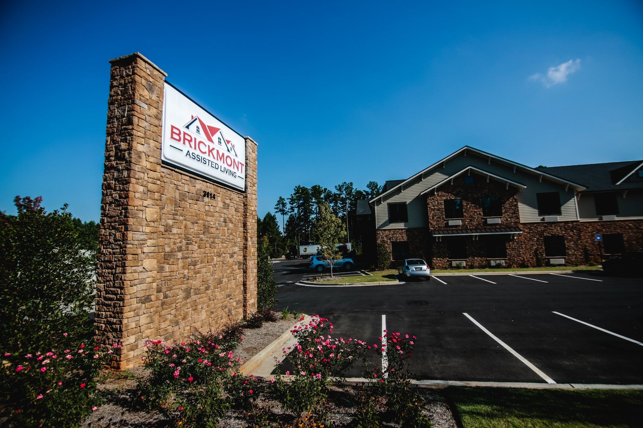 Brickmont at Acworth  senior living community assisted living community sign with beautiful landscaping