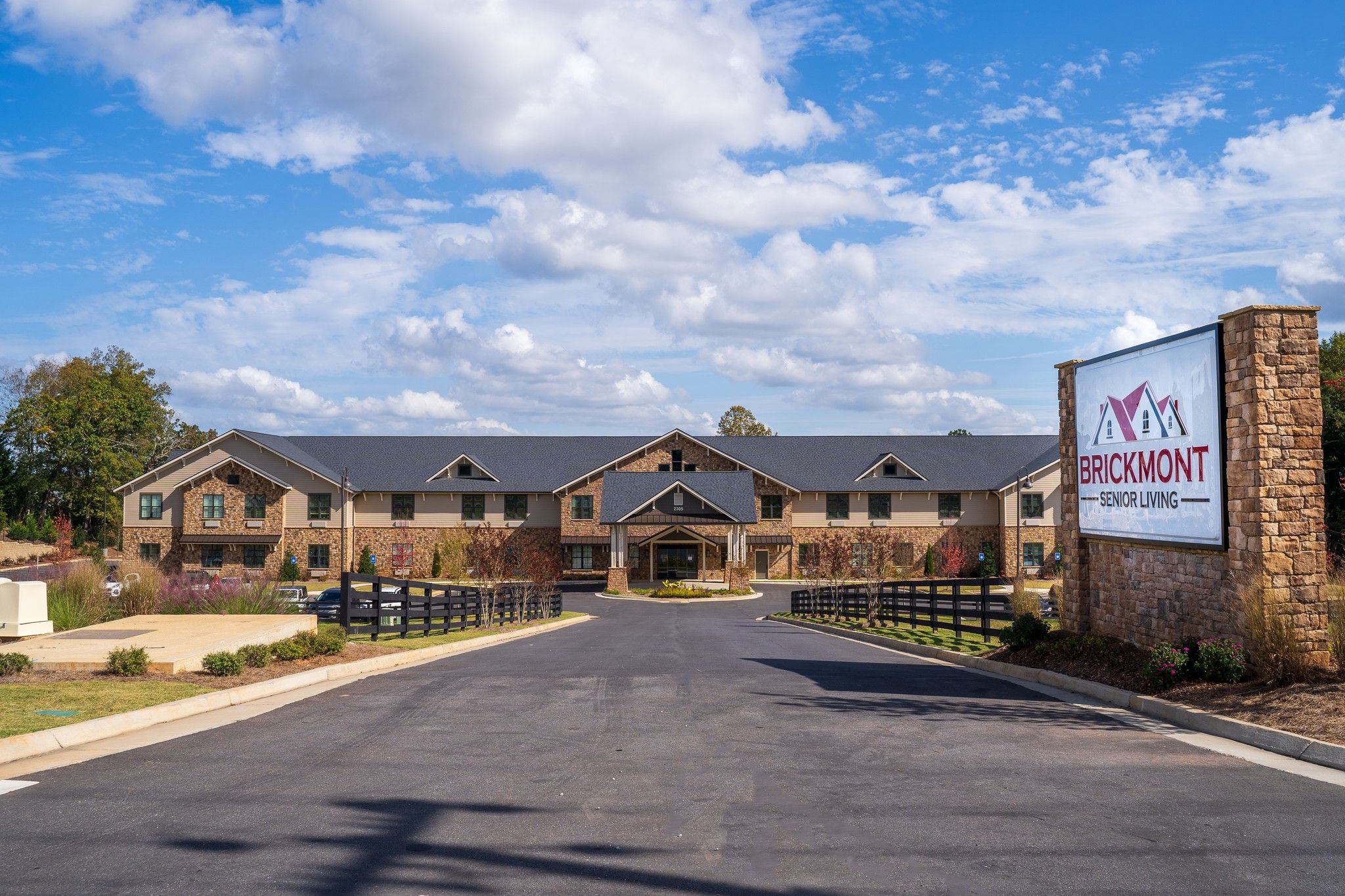 Brickmont at Johns Creek  senior living community assisted living community sign with beautiful landscaping