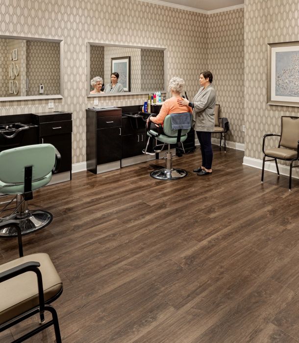 Brickmont at Johns Creek senior living resident salon amenity with styling chairs