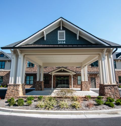 Brickmont at Roswell  outdoor exterior building covered entrance with landscaping