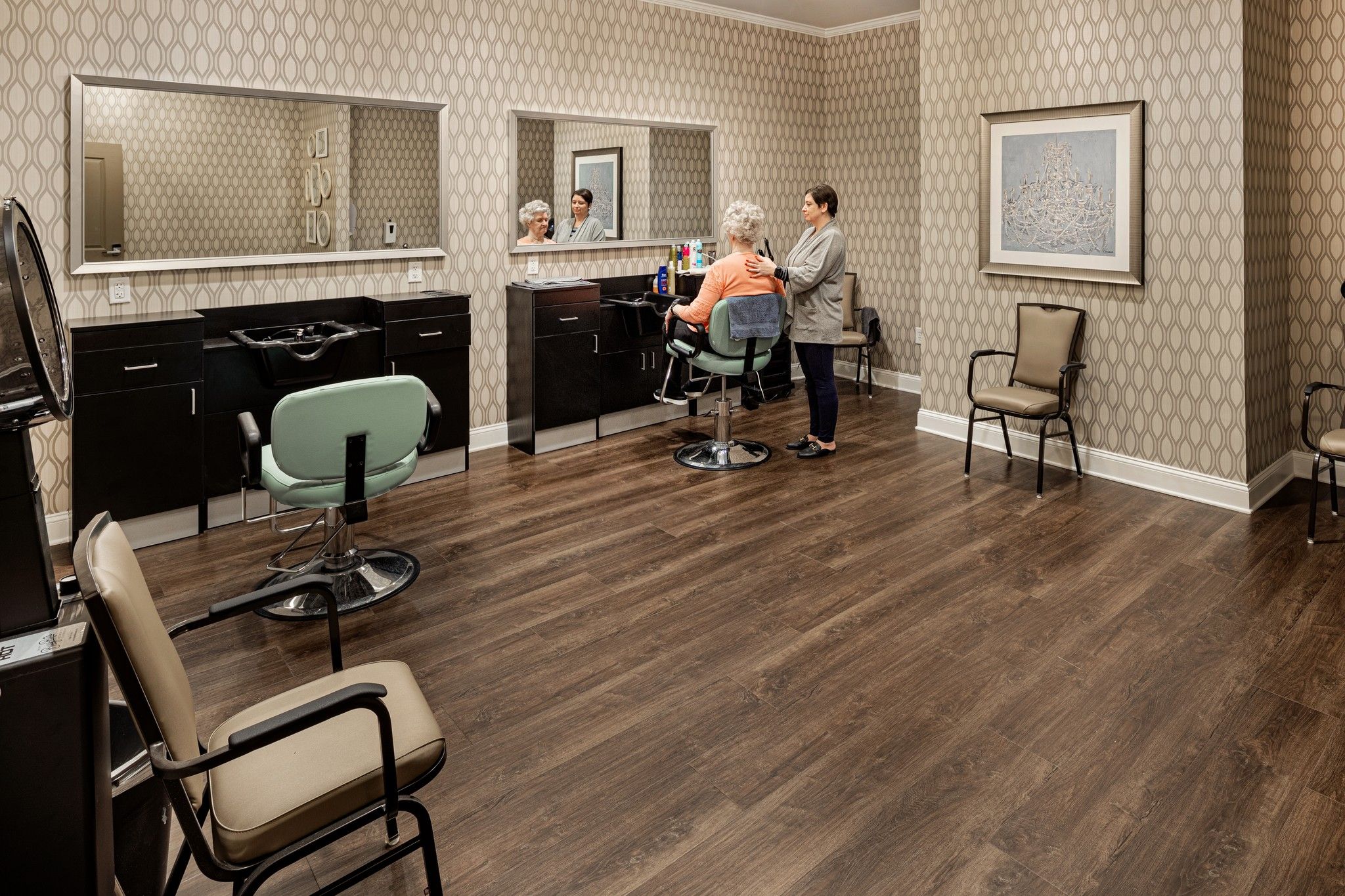 Brickmont at West Cobb senior living resident salon amenity with styling chairs