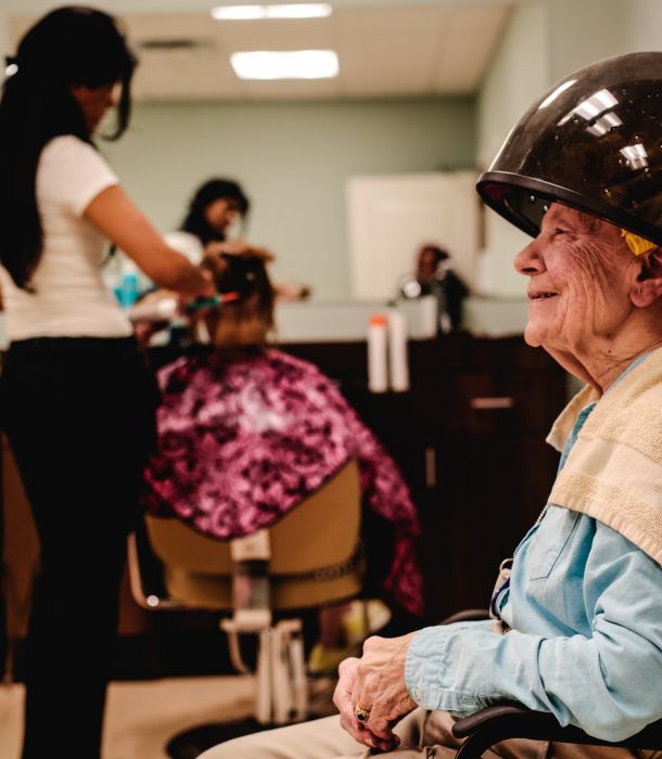 Brickmont at Woodstock senior woman in the on-site salon of a senior living community