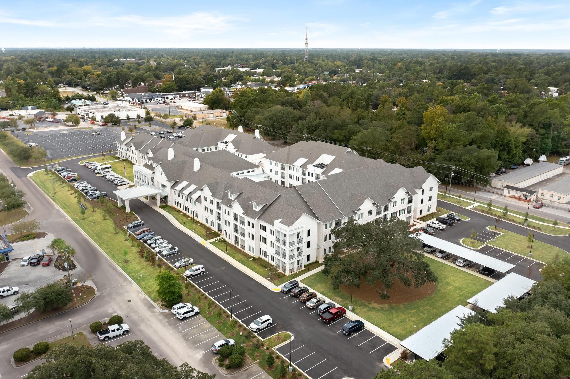The Claiborne at Brickyard Crossing aerial view of community showing wooded setting