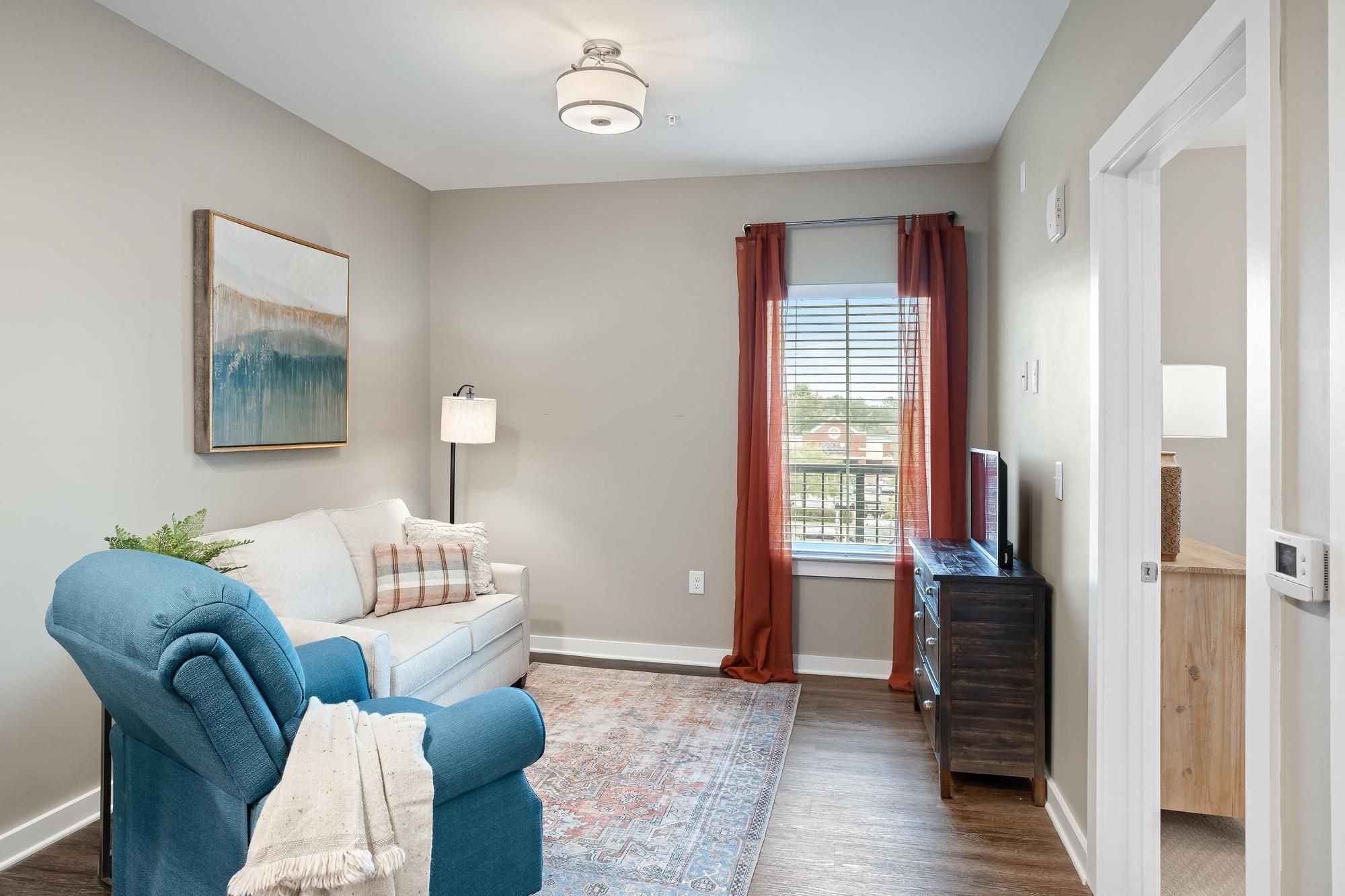 The Claiborne at Brickyard Crossing assisted living apartment living room