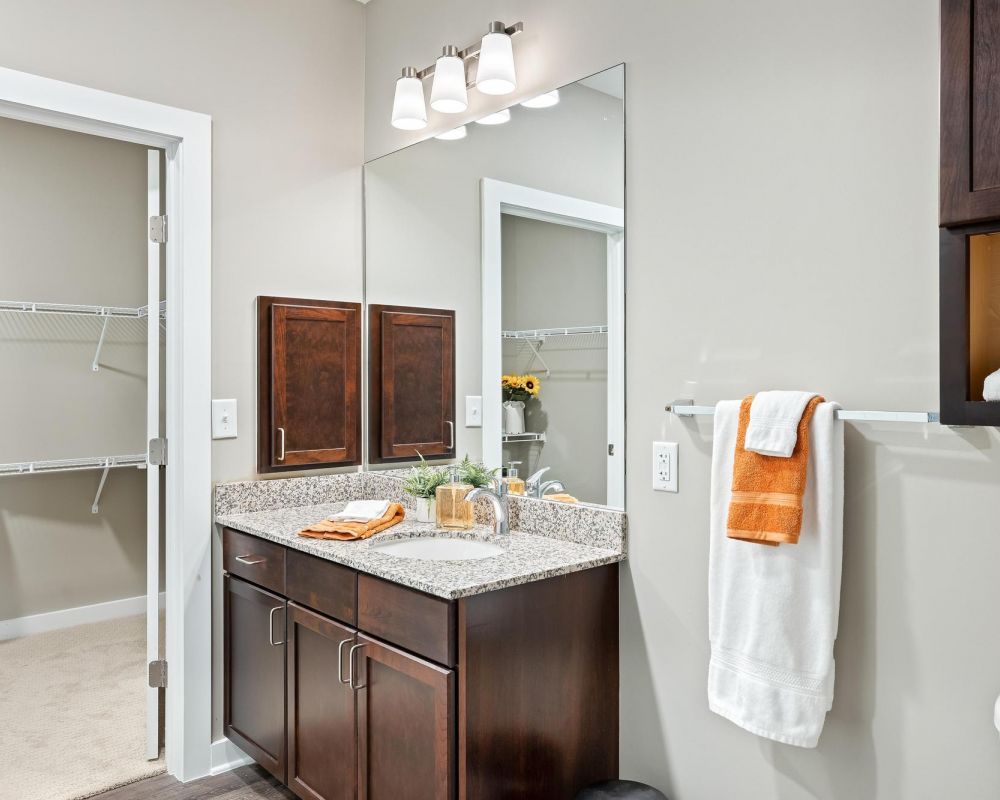 The Claiborne at Brickyard Crossing senior independent living bathroom showing walk-in closet