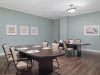 The Claiborne at Acworth senior living community art and painting activity in progress in the activity room