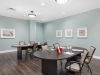 The Claiborne at Johns Creek senior living community art and painting activity in progress in the activity room