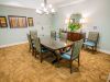 The Claiborne at Roswell amenity private dining room with dining table and chairs and upscale furnishings