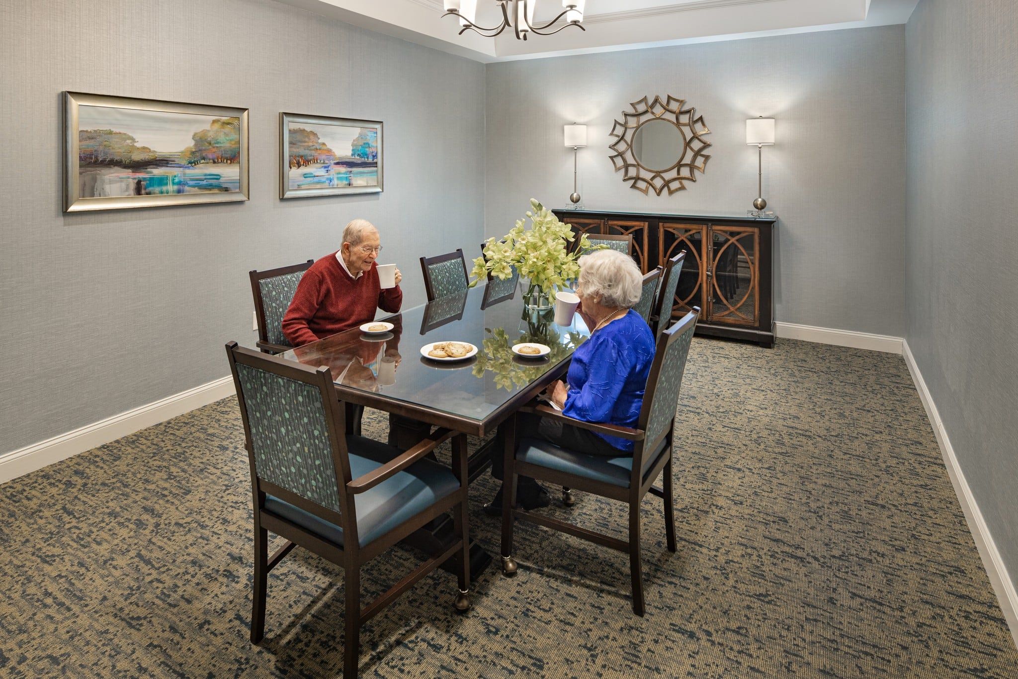 The Claiborne at West Cobb amenity private dining room with dining table and chairs and upscale furnishings