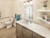 The Claiborne at West Cobb apartment bathroom with accessible toilet and ample storage