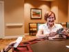 The Claiborne at Woodstock senior living community residents playing cards in the gaming lounge