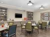 The Claiborne at Woodstock senior living community art and painting activity in progress in the activity room