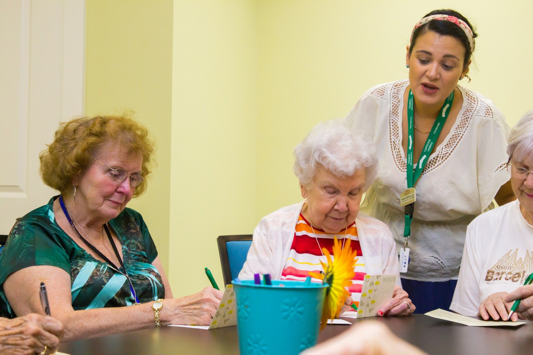 The Claiborne at Woodstock senior living community creative activity in progress with an instructor