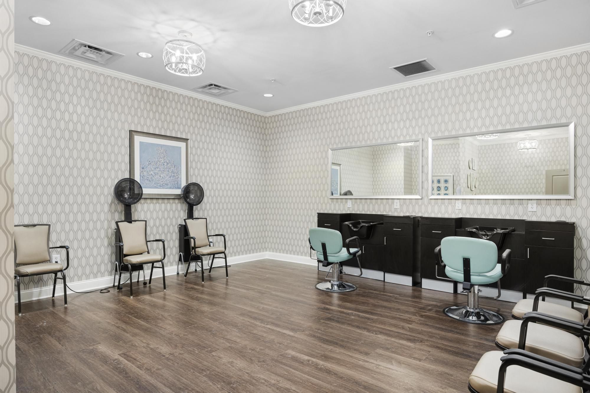 The Claiborne at Woodstock resident salon amenity with styling chairs