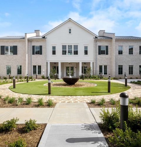 The Claiborne at Gulfport Highlands outdoor courtyard with fountain and terrrace