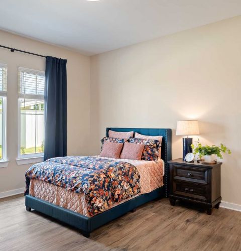 The Claiborne at Gulfport Highlands senior apartment bedroom