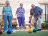 The Claiborne at Hattiesburg senior residents playing Bocce Ball