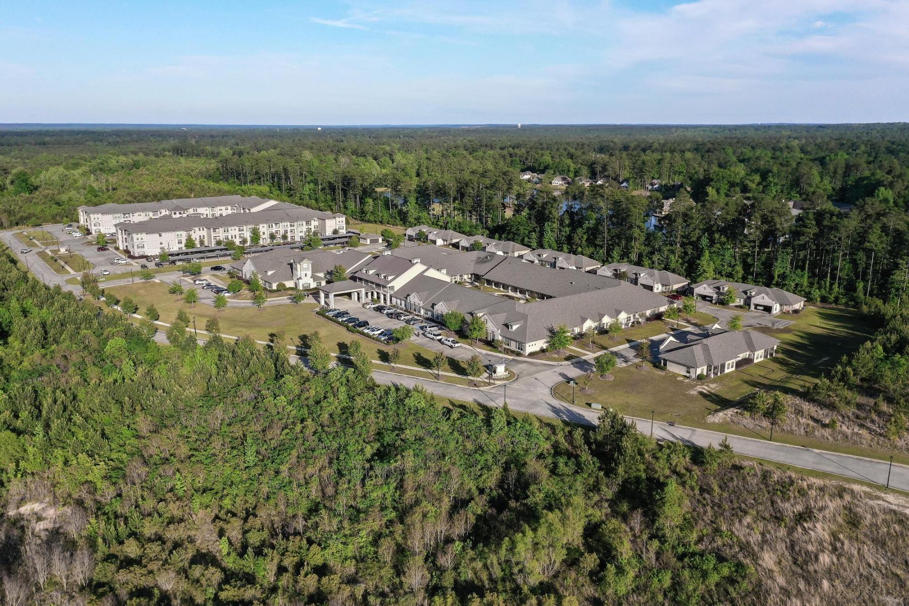 The Claiborne at Hattiesburg aerial view of community and bus that provides transportation