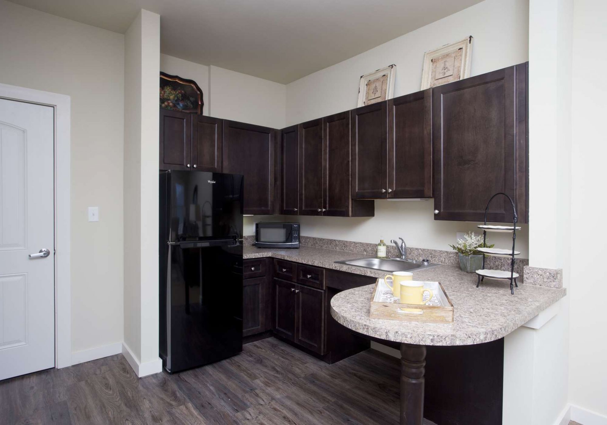 The Claiborne at McComb senior living community full kitchen with high-end finishes