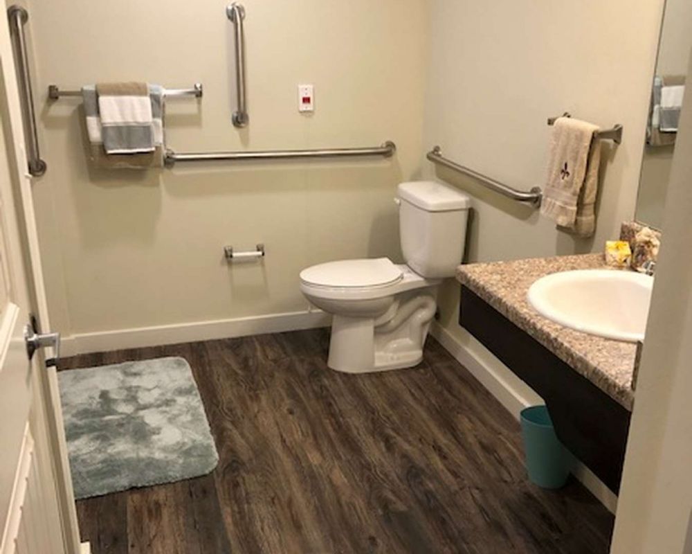 The Claiborne at McComb memory care unit bathroom with accessibility features