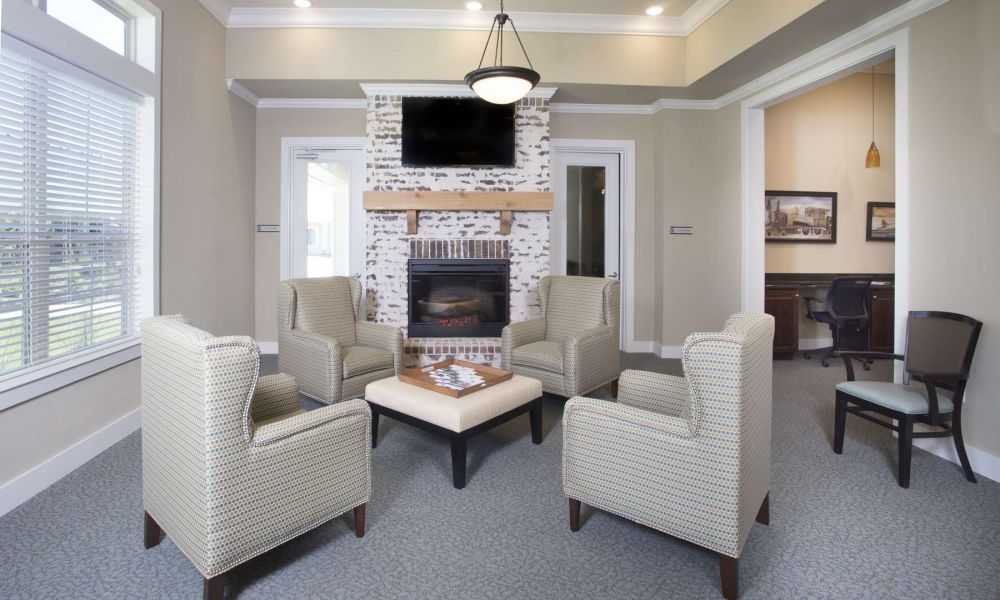 The Claiborne at McComb memory care seating area