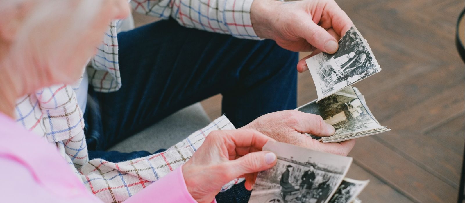 Couple looking at old photos