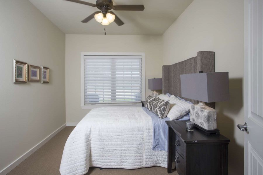 The Claiborne at McComb senior living community assisted living bedroom