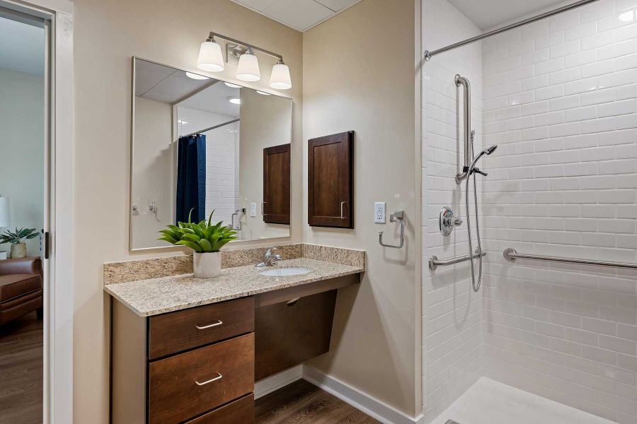 The Claiborne at Newnan Lakes memory care unit bathroom with accessibility features