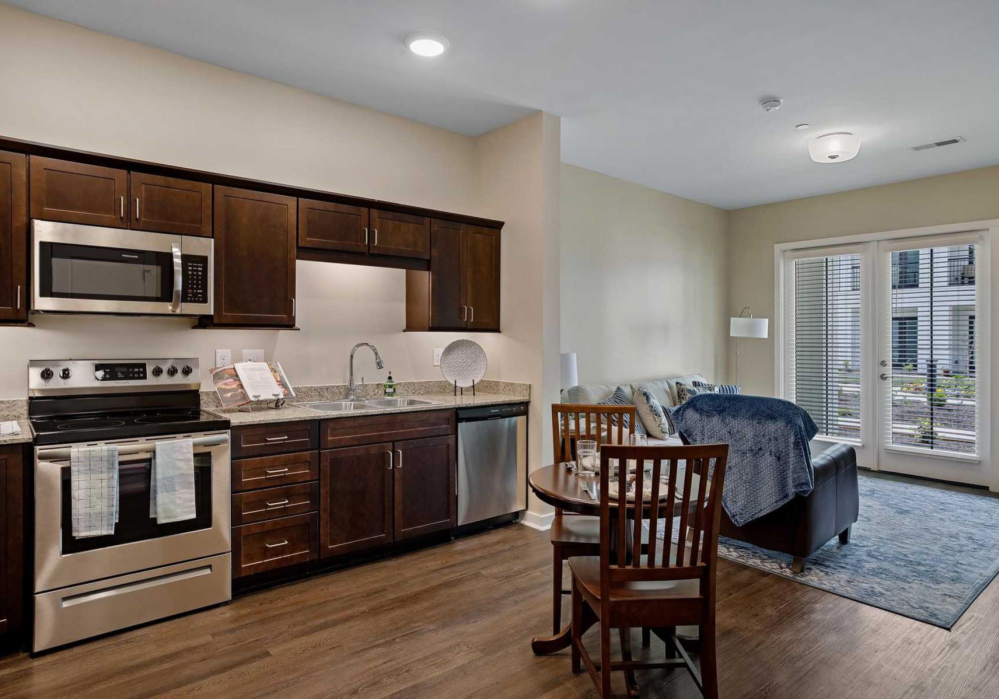 The Claiborne at Newnan Lakes senior living community full kitchen with high-end finishes