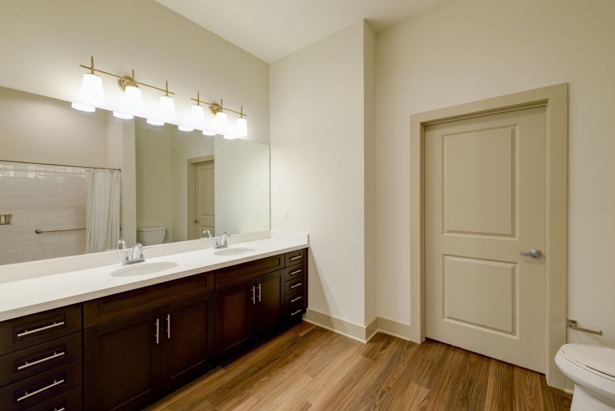 The Preserve at Meridian senior living community bathroom with double sinks and large mirror