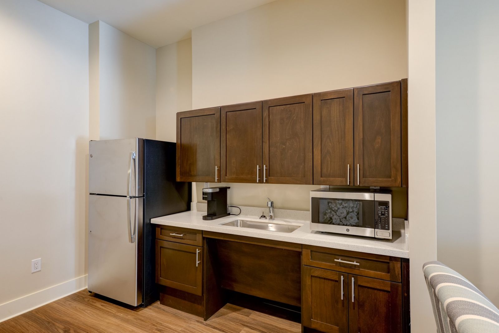 The Preserve at Meridian assisted living kitchenette showing accessibility features including sink and cabinet height
