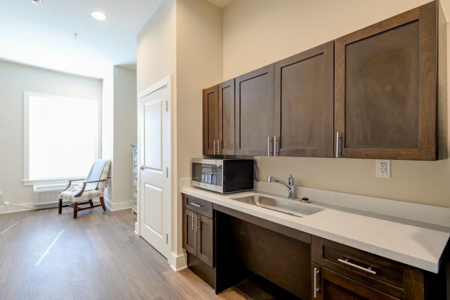 The Preserve at Meridian assisted living apartment kitchenette with accessibility features