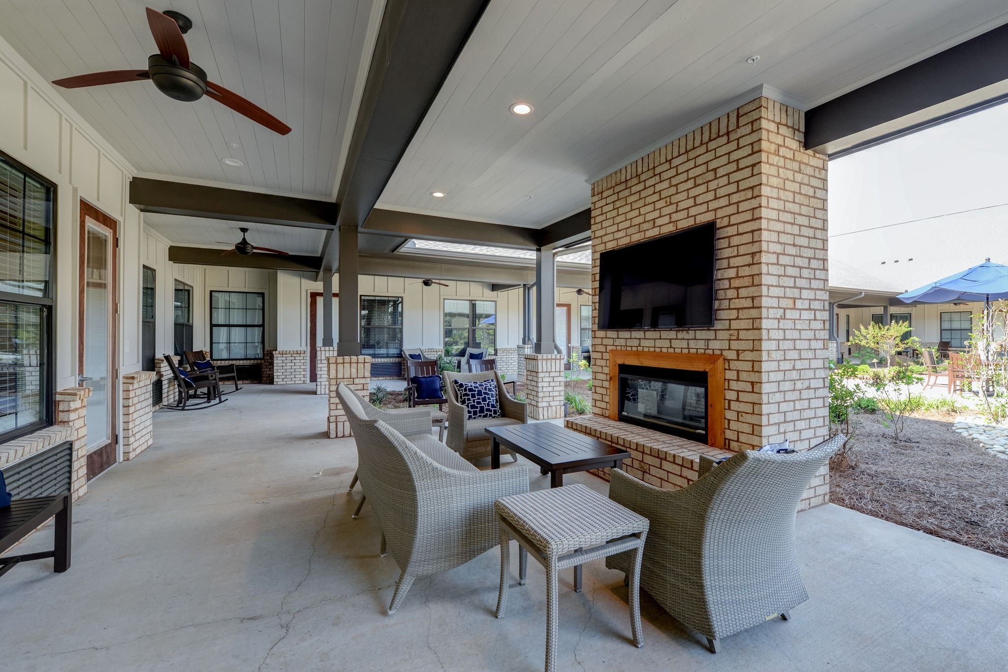 The Preserve at Meridian outdoor courtyard view with fireplace and tv