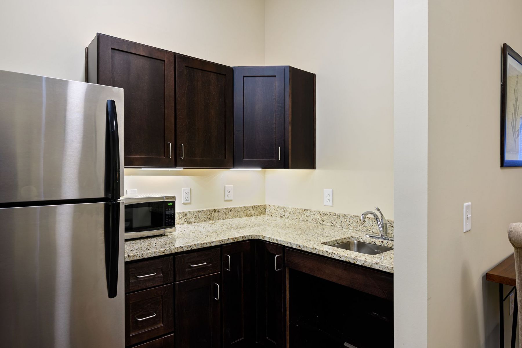  senior living community residence kitchenThe Claiborne at Shoe Creek