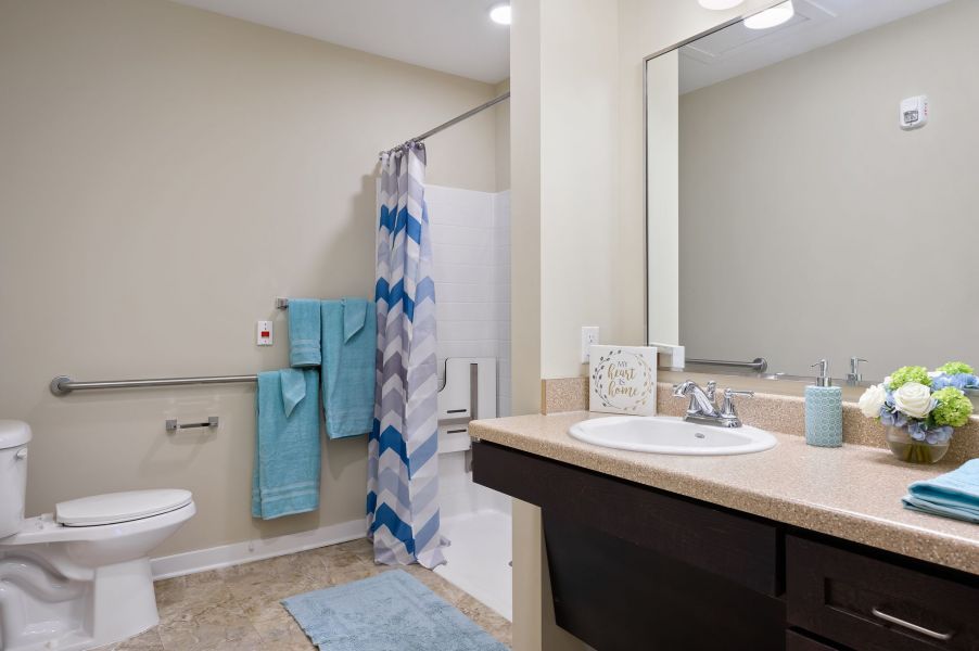 The Claiborne at Shoe Creek memory care unit bathroom with accessibility features