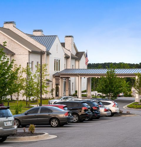 The Claiborne at Shoe Creek exterior view of senior living community building