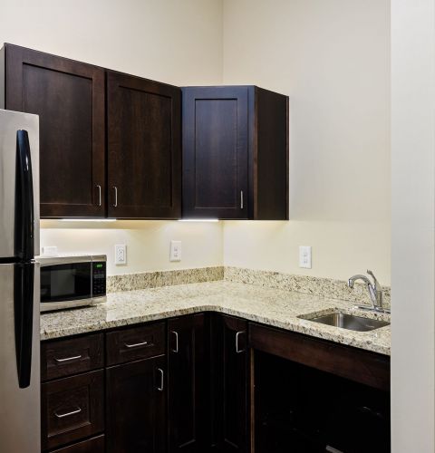 The Claiborne at Shoe Creek senior apartment kitchenette