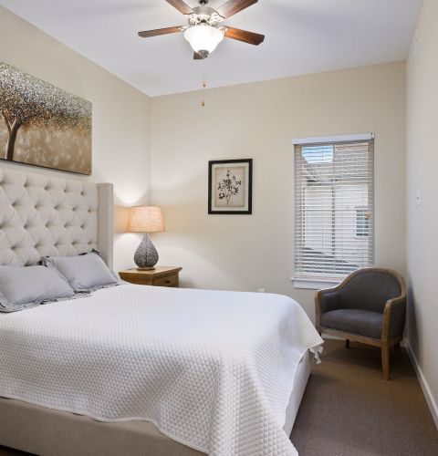 The Claiborne at Shoe Creek senior apartment bedroom