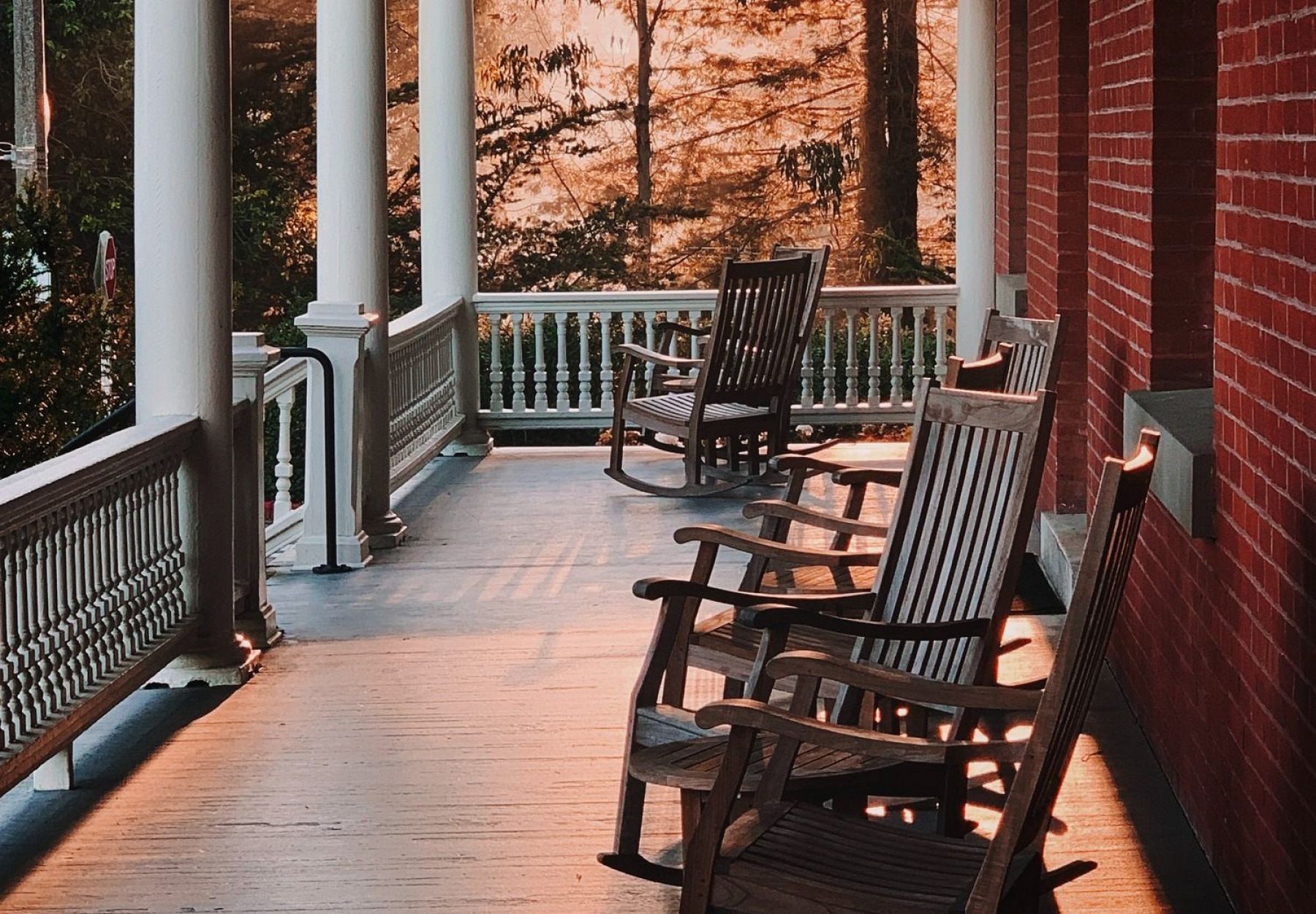 The Claiborne at Simpsonville rocking chairs on porch