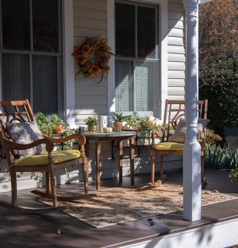 The Claiborne at Thibodaux rocking chairs on porch