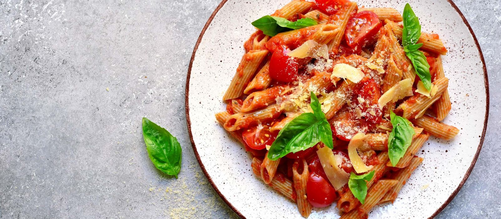 Penne pasta with tomato in red sauce.