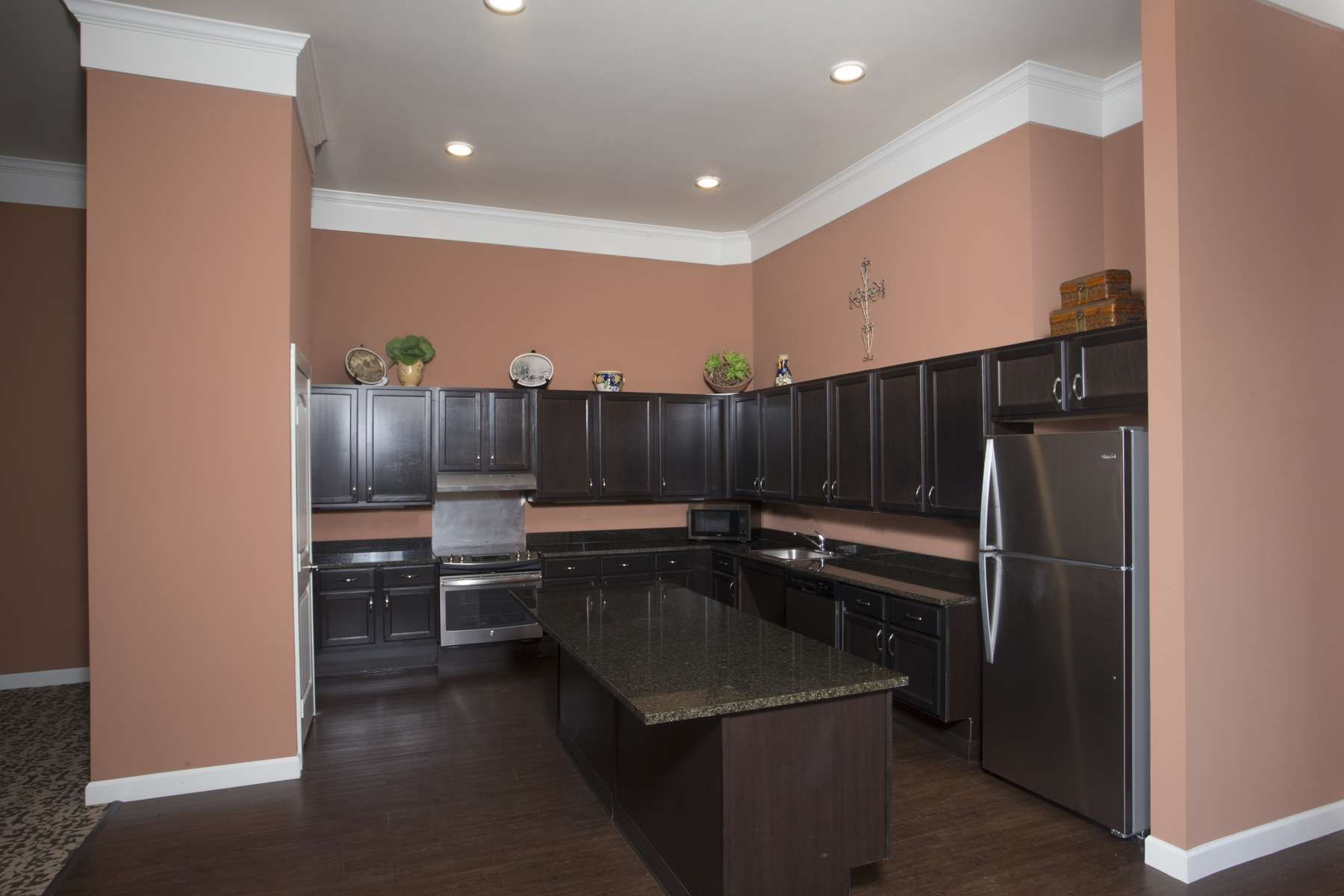 The Claiborne at Thibodaux senior apartment full kitchen with high-end design and appliances