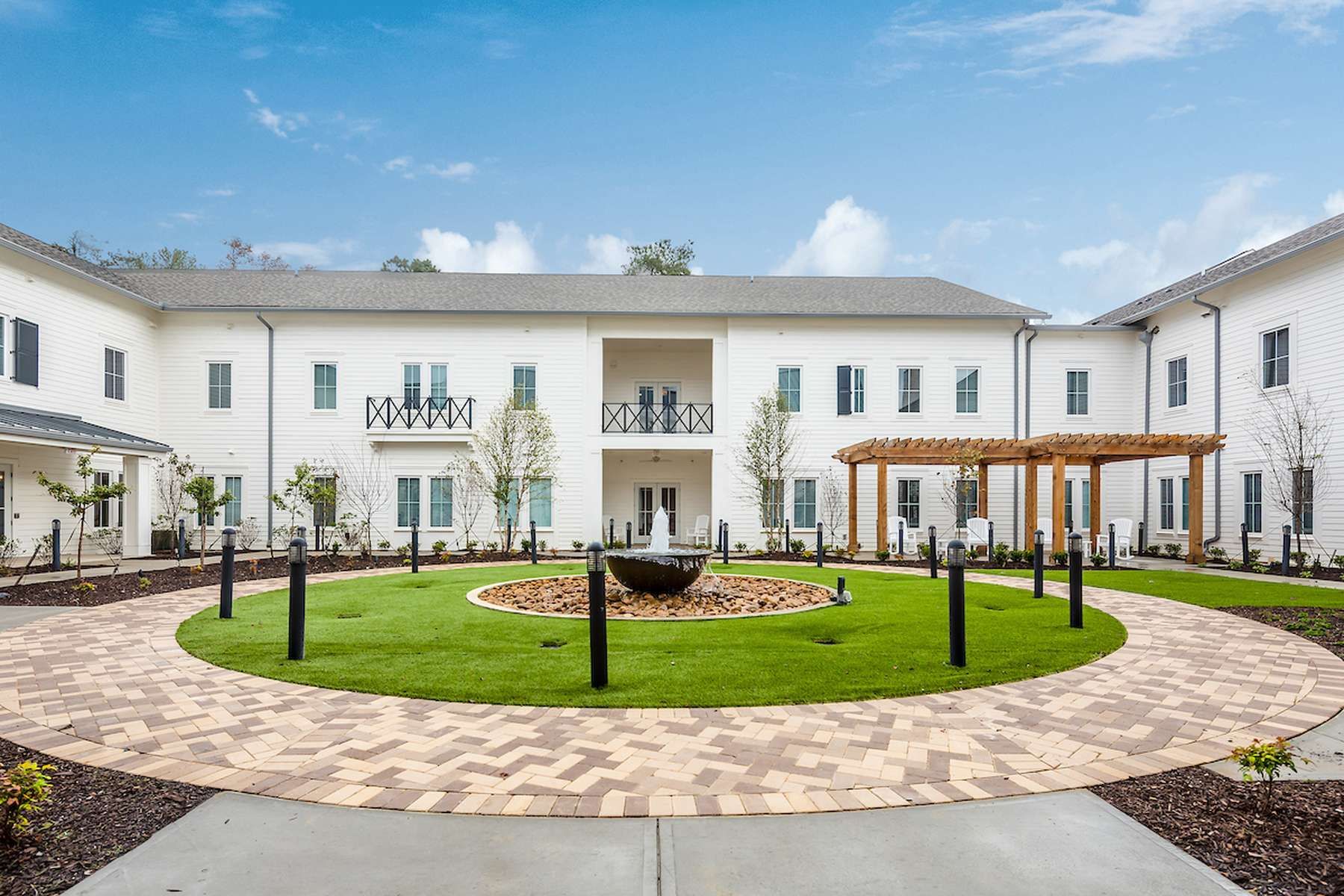 The Claiborne at West Lake outdoor courtyard with fountain and terrace