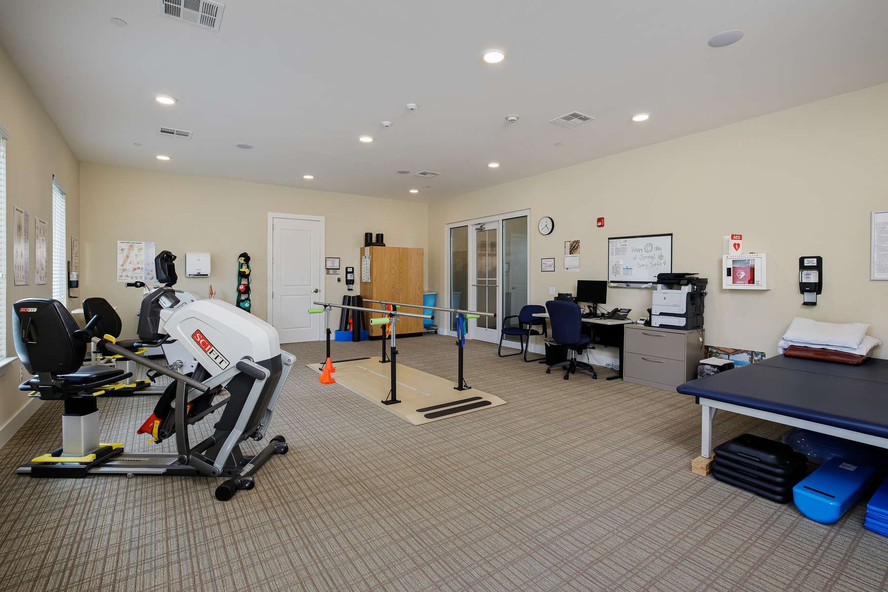 The Claiborne at West Lake senior living community physical therapy equipment and room