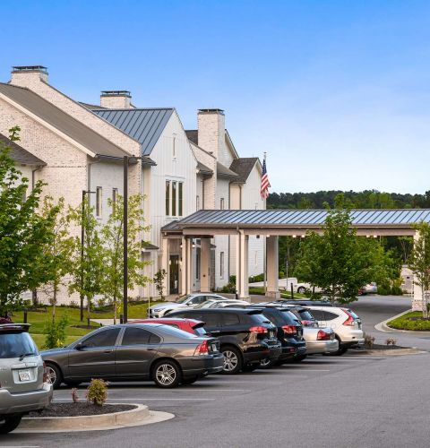 The Claiborne at West Lake exterior of senior living community building in Martinez, GA